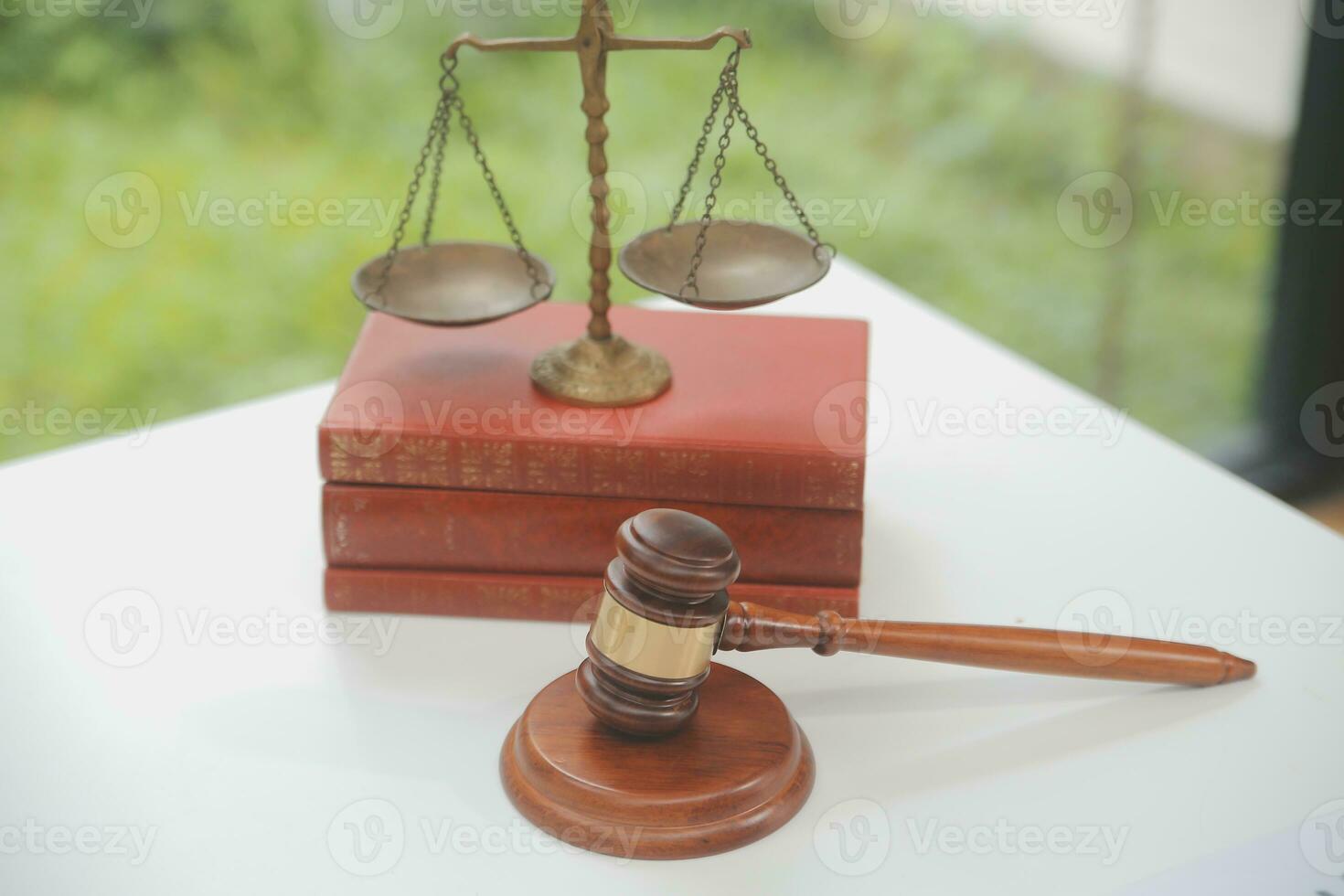 Business and lawyers discussing contract papers with brass scale on desk in office. Law, legal services, advice, justice and law concept picture with film grain effect photo