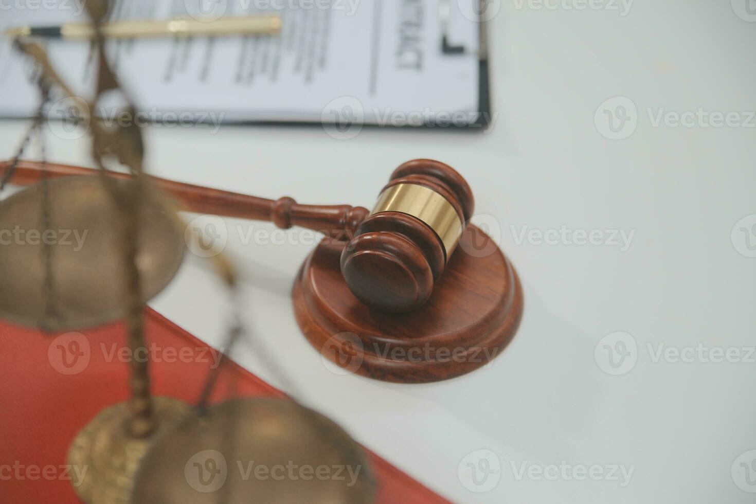 Business and lawyers discussing contract papers with brass scale on desk in office. Law, legal services, advice, justice and law concept picture with film grain effect photo