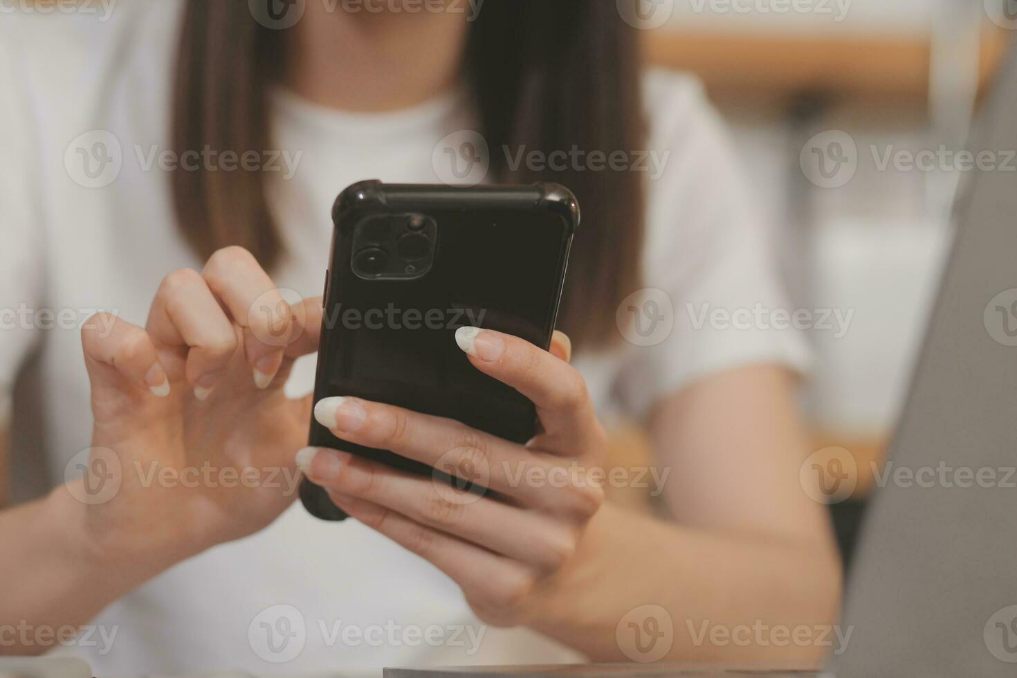 Cropped photo of Freelancer business Asian woman holding coffee cup and at doing planning analyzing the financial report, business plan investment, finance analysis the workplace.