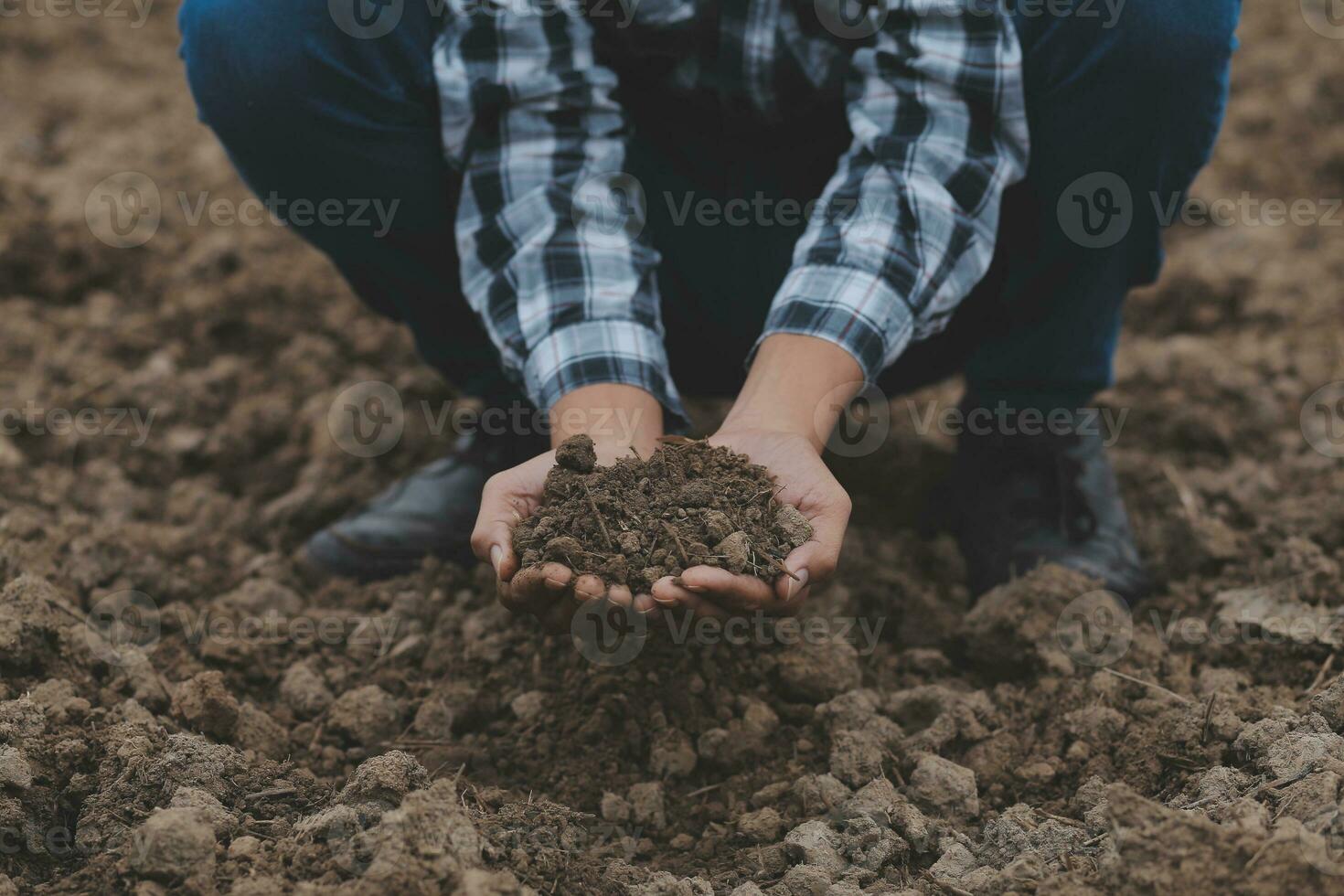 Symbol heart earth day. Handful of dirt hands heart shape. Farm organic earth. Farmer hands soil ground earth dirt garden soil farm ground. Male hands full of fertile land field agriculture concept photo