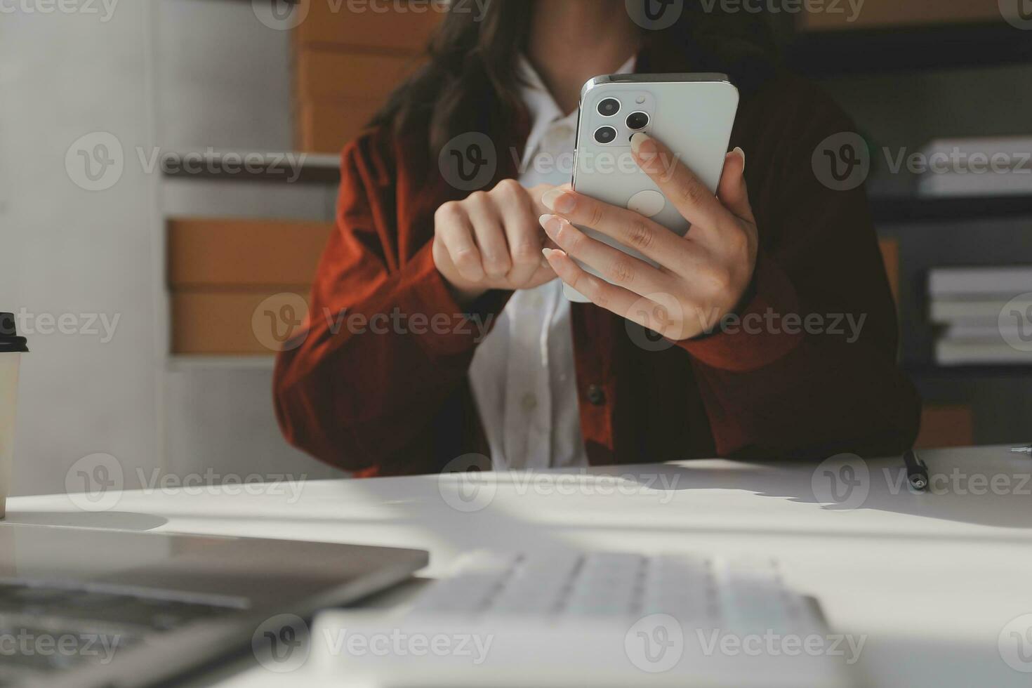 Portrait young attractive hipster asia female owner startup look at camera work happy with box at home prepare parcel delivery in sme supply chain, procurement, omnichannel ecommerce online concept. photo