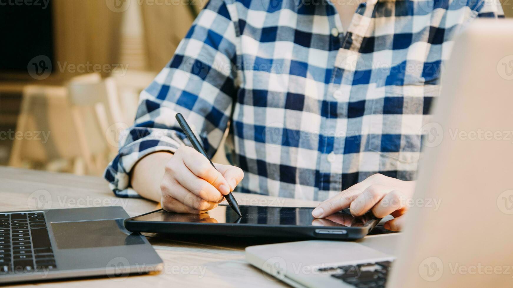 Shot of a asian young business Female working on laptop in her workstation. photo