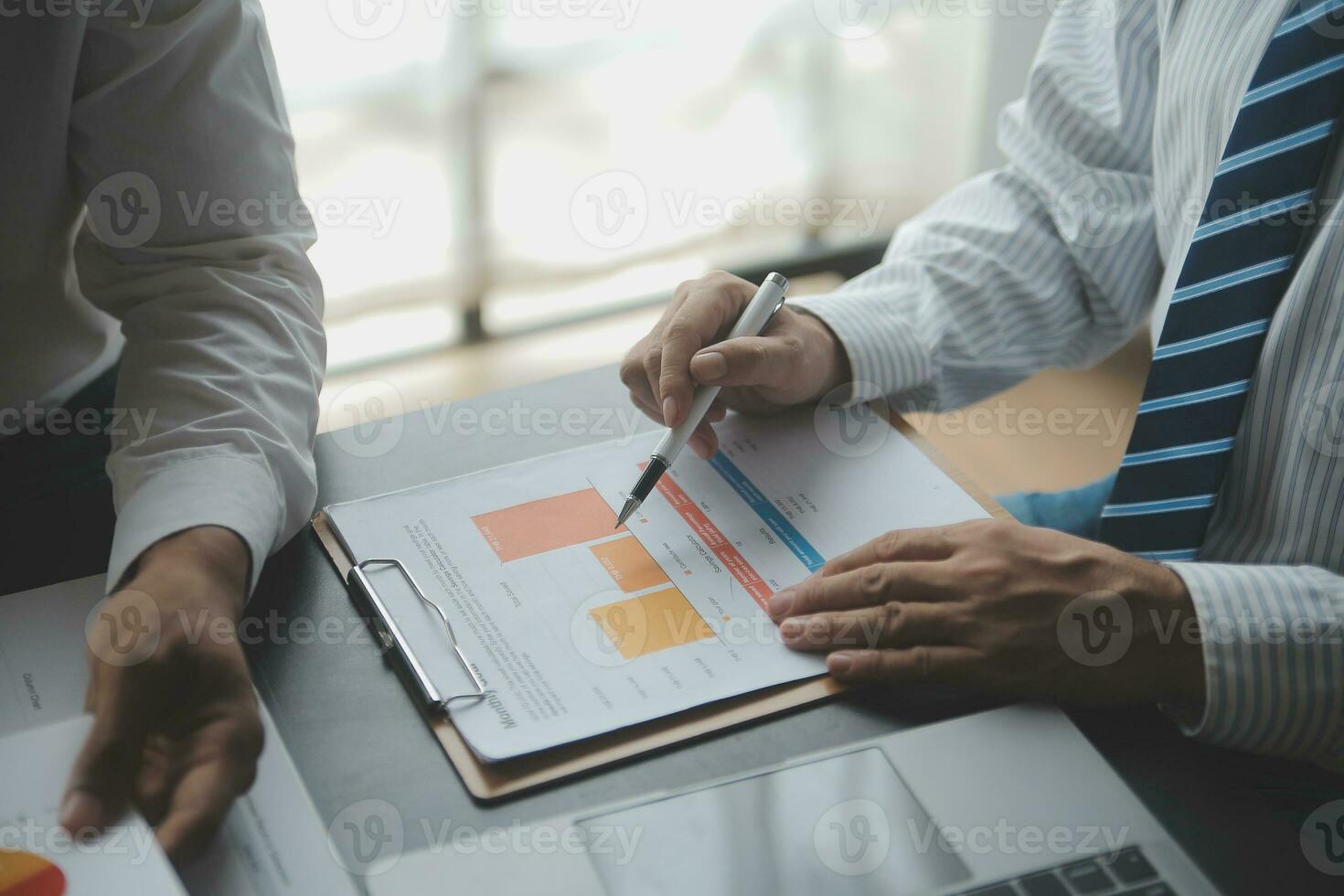 Financial Business woman analyze the graph of the company's performance to create profits and growth, Market research reports and income statistics, data,repotr,Financial and Accounting concept. photo