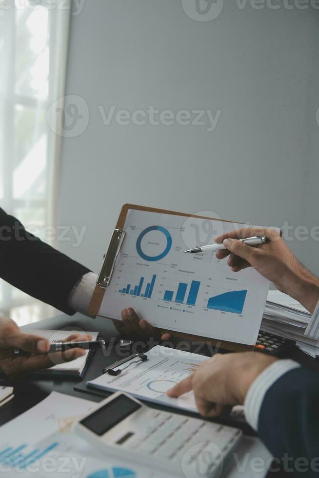 Team of business people working together in the meeting room office, teamwork background charts and graphs banner, double exposure successful teamwork,business planning concept. photo