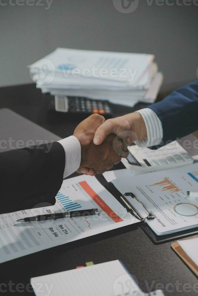 Business handshake for teamwork of business merger and acquisition,successful negotiate,hand shake,two businessman shake hand with partner to celebration partnership and business deal concept photo