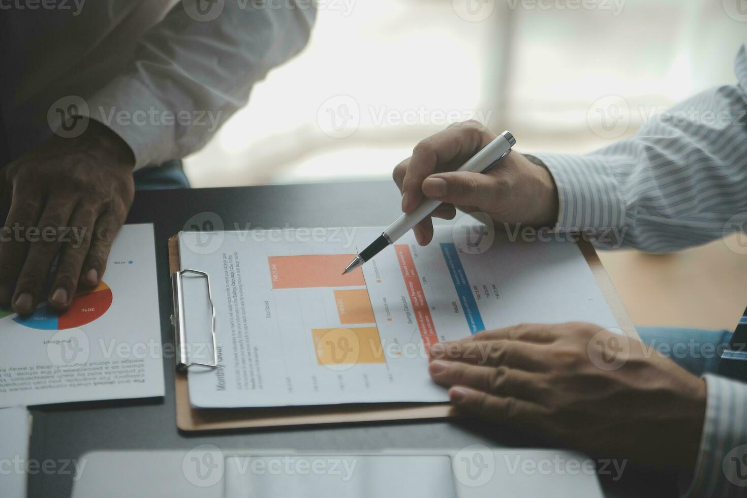 Financial Business woman analyze the graph of the company's performance to create profits and growth, Market research reports and income statistics, data,repotr,Financial and Accounting concept. photo