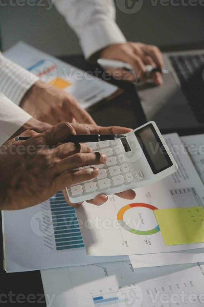 Financial Business woman analyze the graph of the company's performance to create profits and growth, Market research reports and income statistics, data,repotr,Financial and Accounting concept. photo