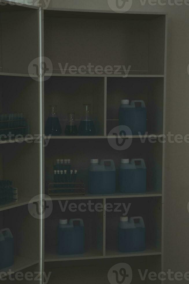 Health care researchers working in life science laboratory. Young female research scientist and senior male supervisor preparing and analyzing microscope slides in research lab. photo