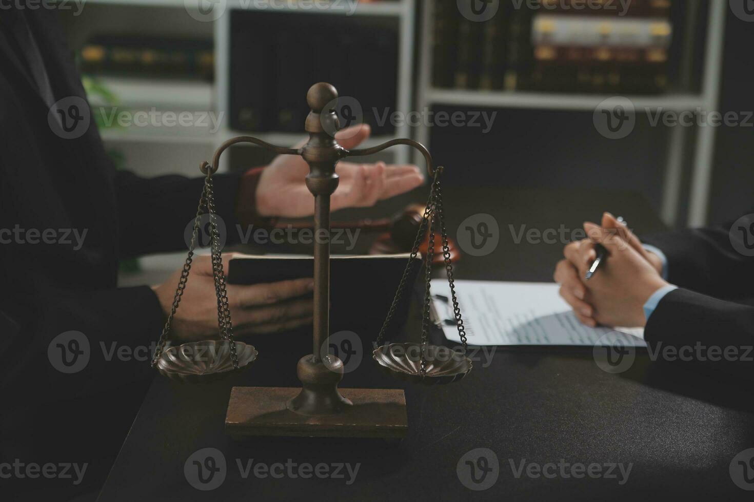 female lawyers working at the law firms. Judge gavel with scales of justice. Legal law, lawyer, advice and justice concept. photo