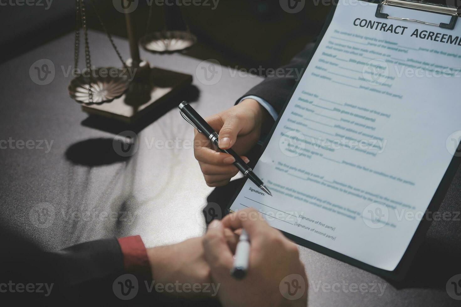 female lawyers working at the law firms. Judge gavel with scales of justice. Legal law, lawyer, advice and justice concept. photo