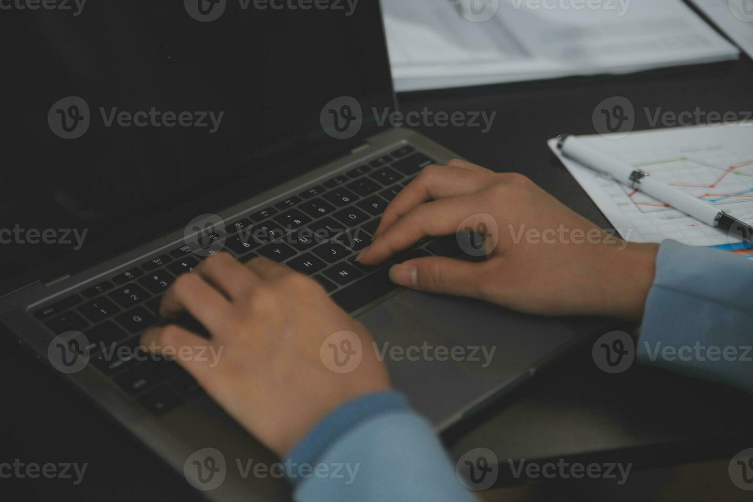 Financial Business team present. Business man hands hold documents with financial statistic stock photo, discussion, and analysis report data the charts and graphs. Finance Financial concept photo