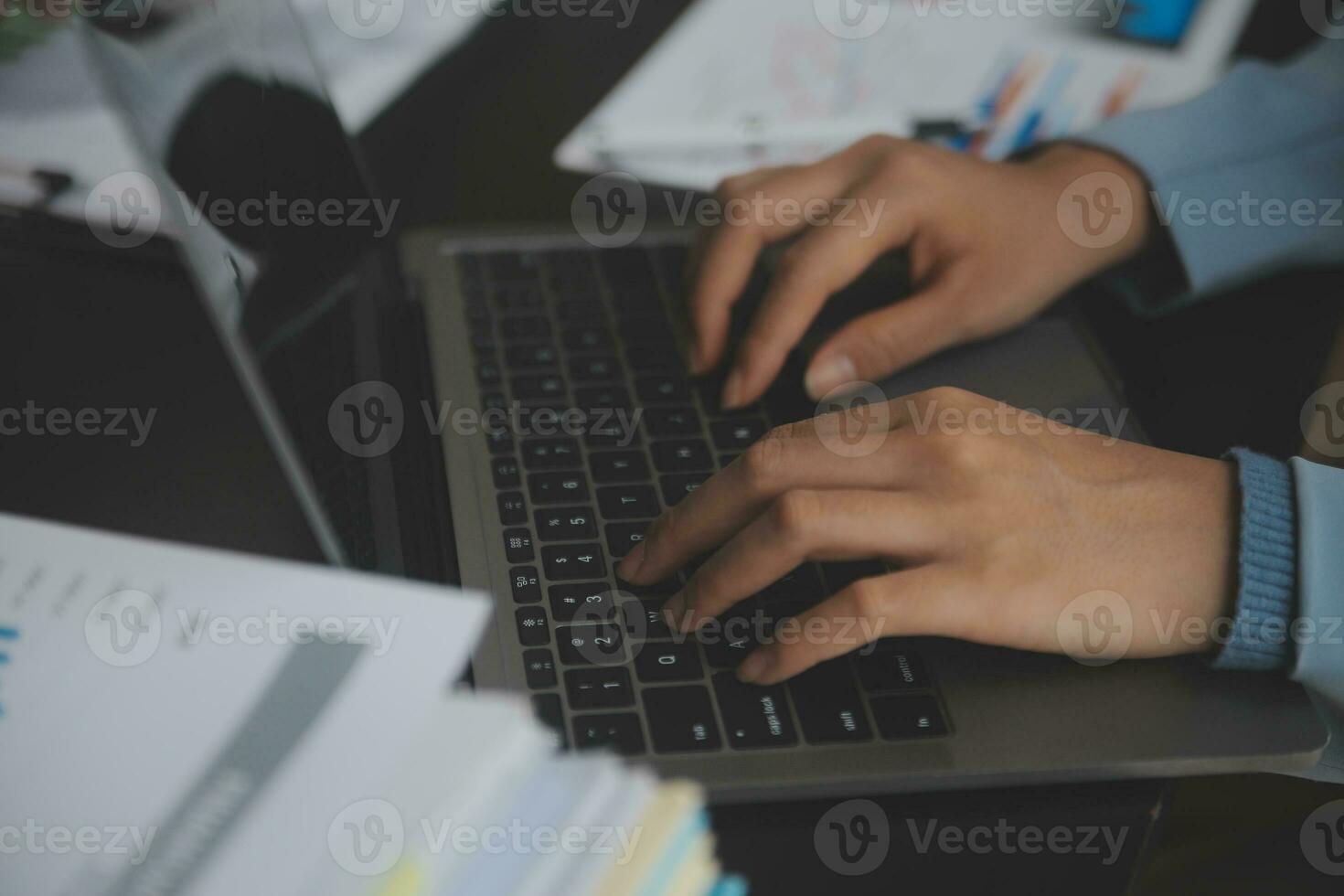 Financial Business team present. Business man hands hold documents with financial statistic stock photo, discussion, and analysis report data the charts and graphs. Finance Financial concept photo