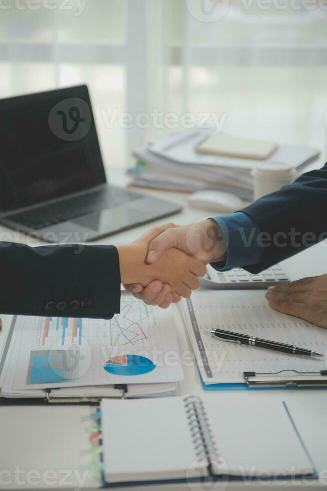 Business handshake for teamwork of business merger and acquisition,successful negotiate,hand shake,two businessman shake hand with partner to celebration partnership and business deal concept photo