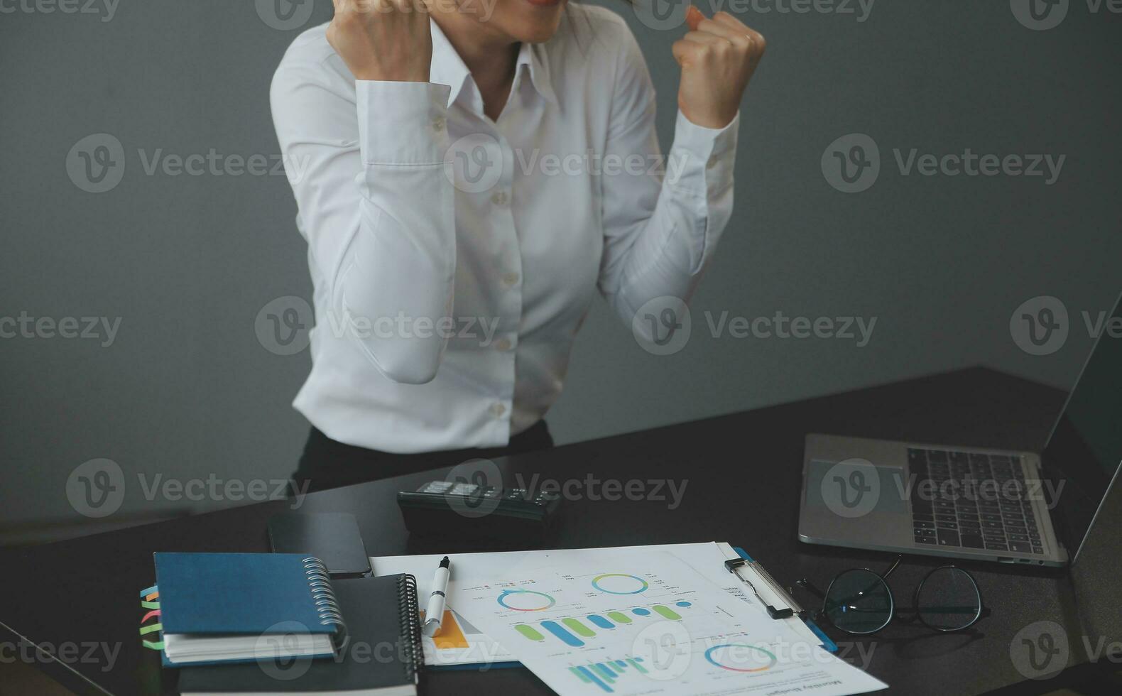 Entrepreneur Asian businessman and businesswoman discussing new business project in tablet in modern Meeting In Modern Office, Asian business casual concept. photo