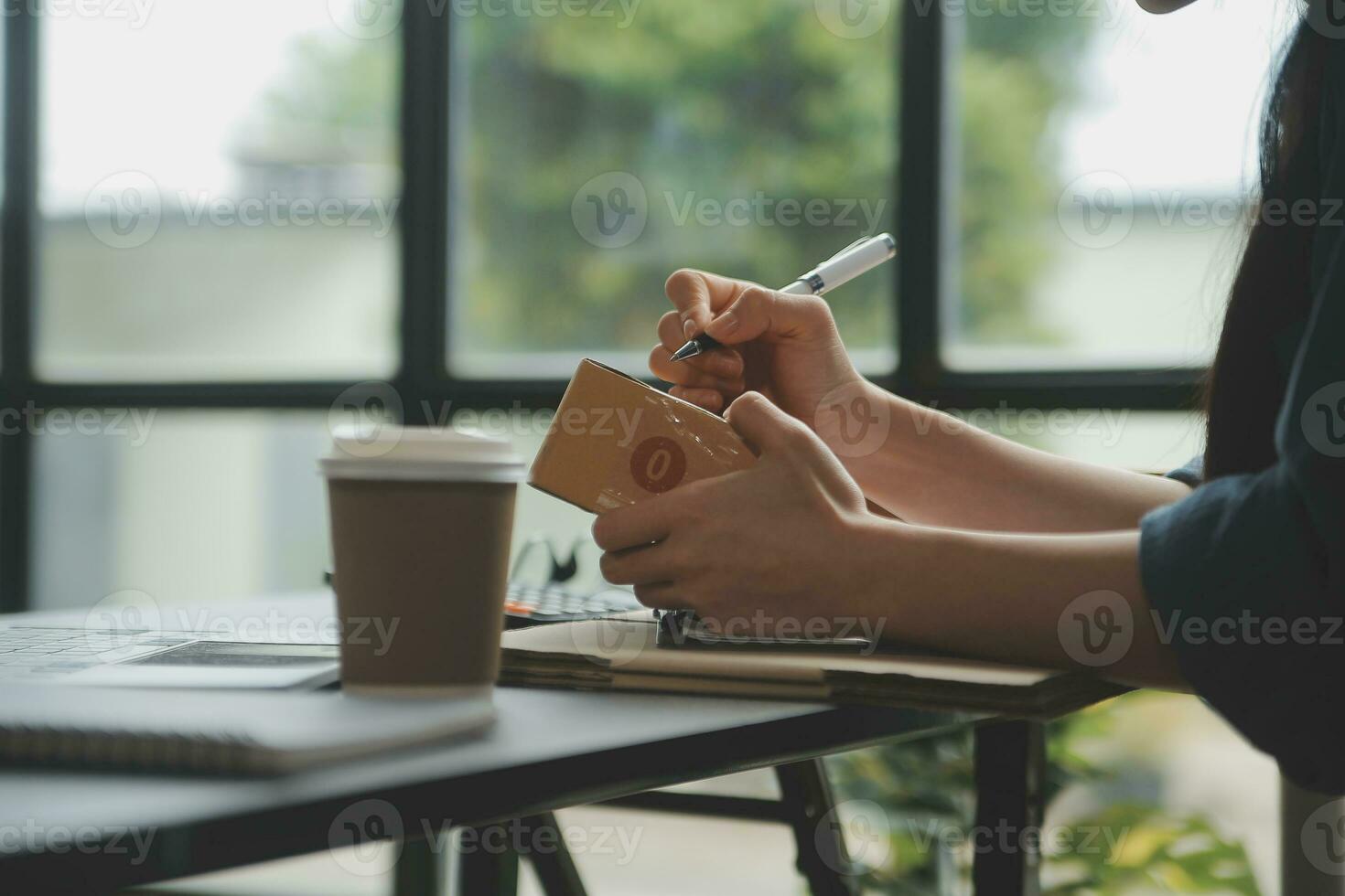 Business woman start up small business entrepreneur SME success .freelance woman working at home with Online Parcel delivery. SME and packaging deliveryconcept photo