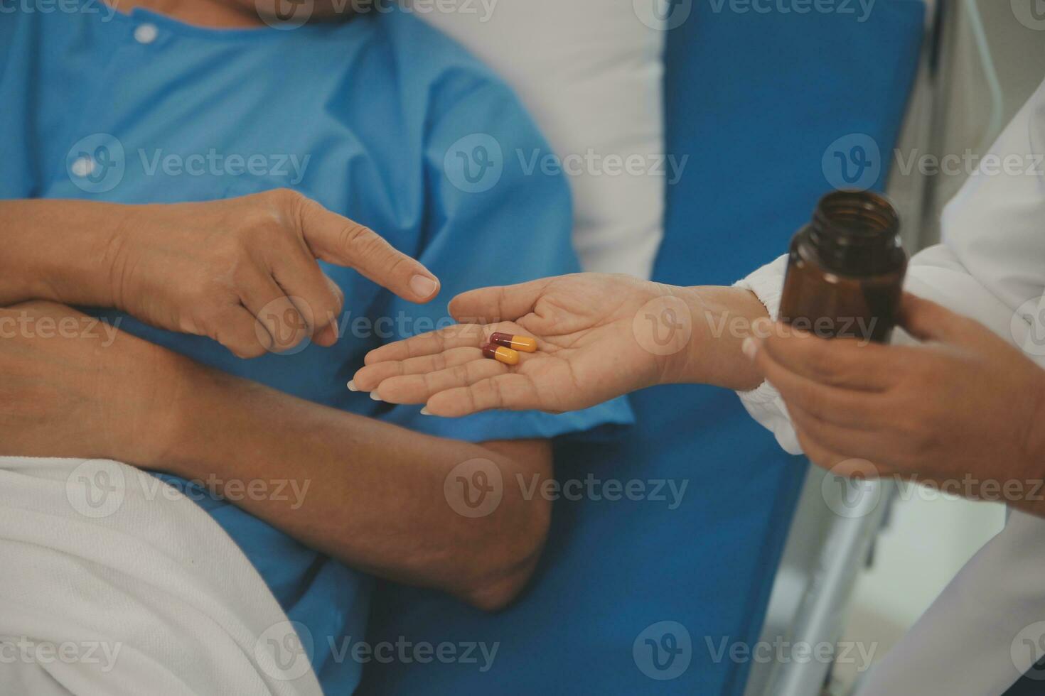 Close up of Female Doctor using stethoscope putting beat heart diagnose with patient in examination room at a hospital, check-up body, Medical and Health Care Concept. photo