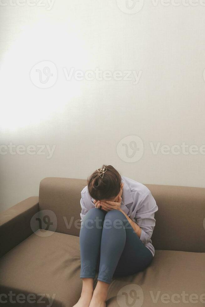 Sad, unhappy. Alone asian young woman, girl expression face thinking about problem, difficulty, feeling failure and exhausted, suffering from loneliness, grief sorrow and bad relationship or break up. photo