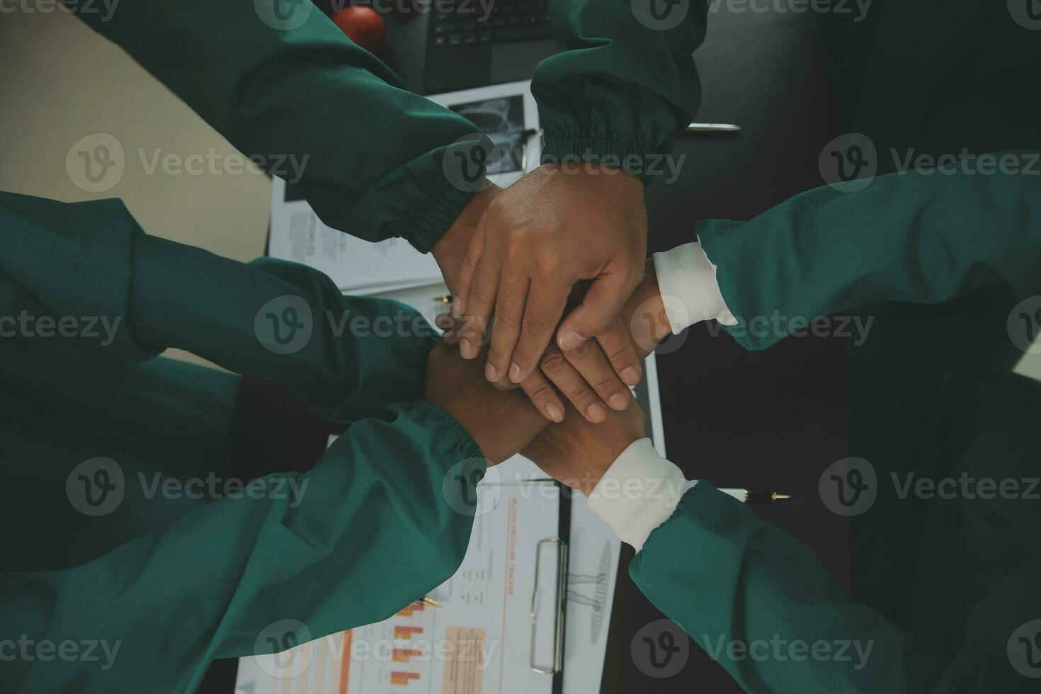 Doctor and female patient meeting at the hospital and shaking hands, healthcare and medicine banner photo