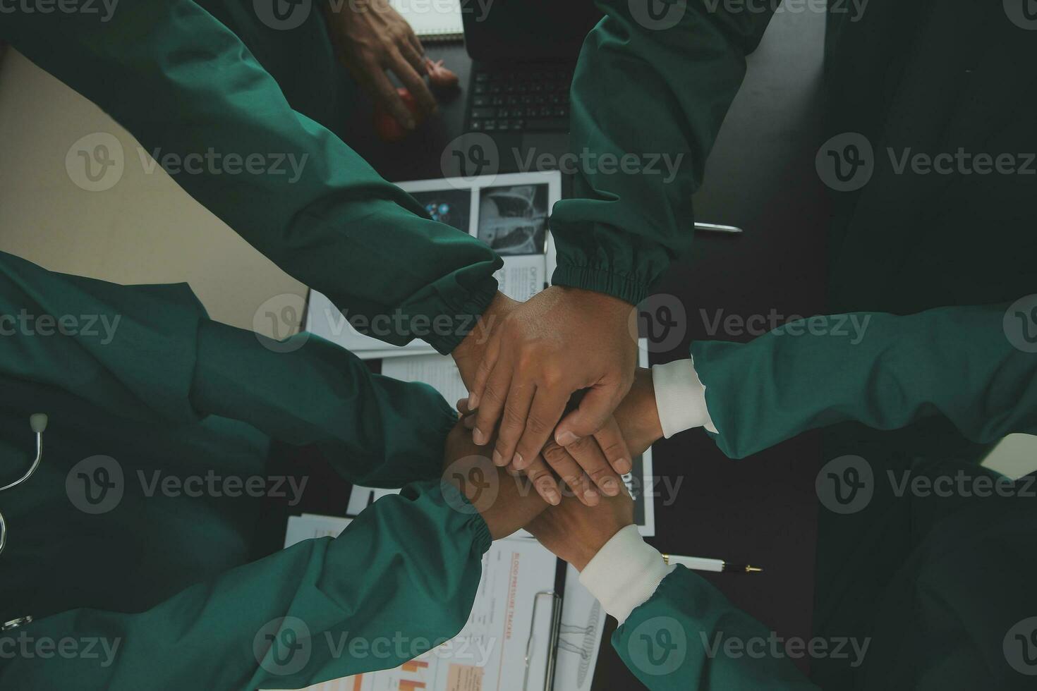 Doctor and female patient meeting at the hospital and shaking hands, healthcare and medicine banner photo