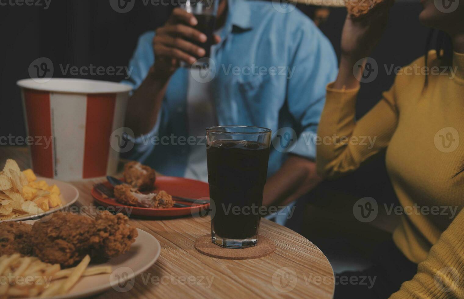 fat woman bite piece of pizza,overweight female is eating fast foods,asian girl is hungry photo