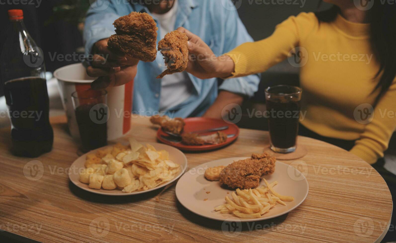 fat woman bite piece of pizza,overweight female is eating fast foods,asian girl is hungry photo