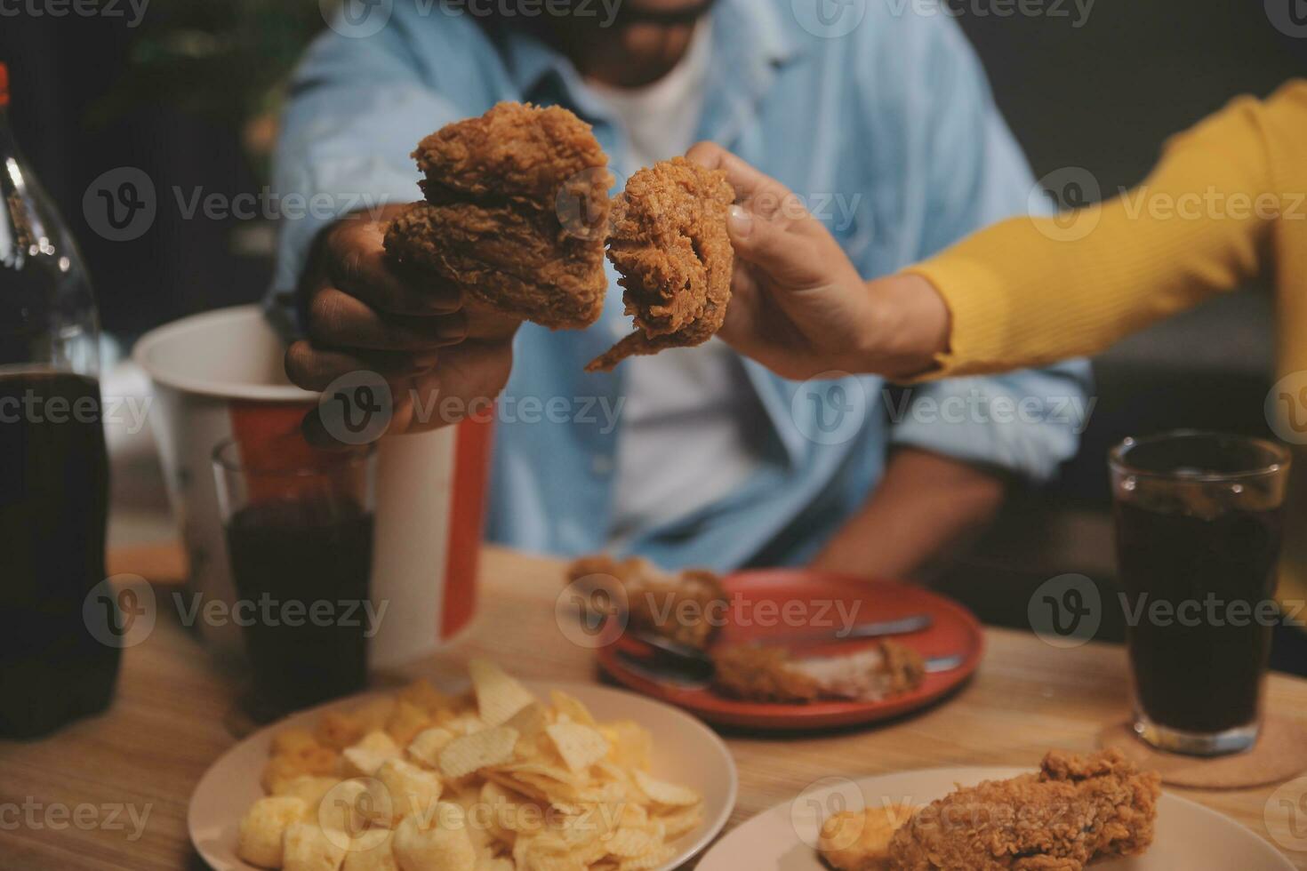 fat woman bite piece of pizza,overweight female is eating fast foods,asian girl is hungry photo