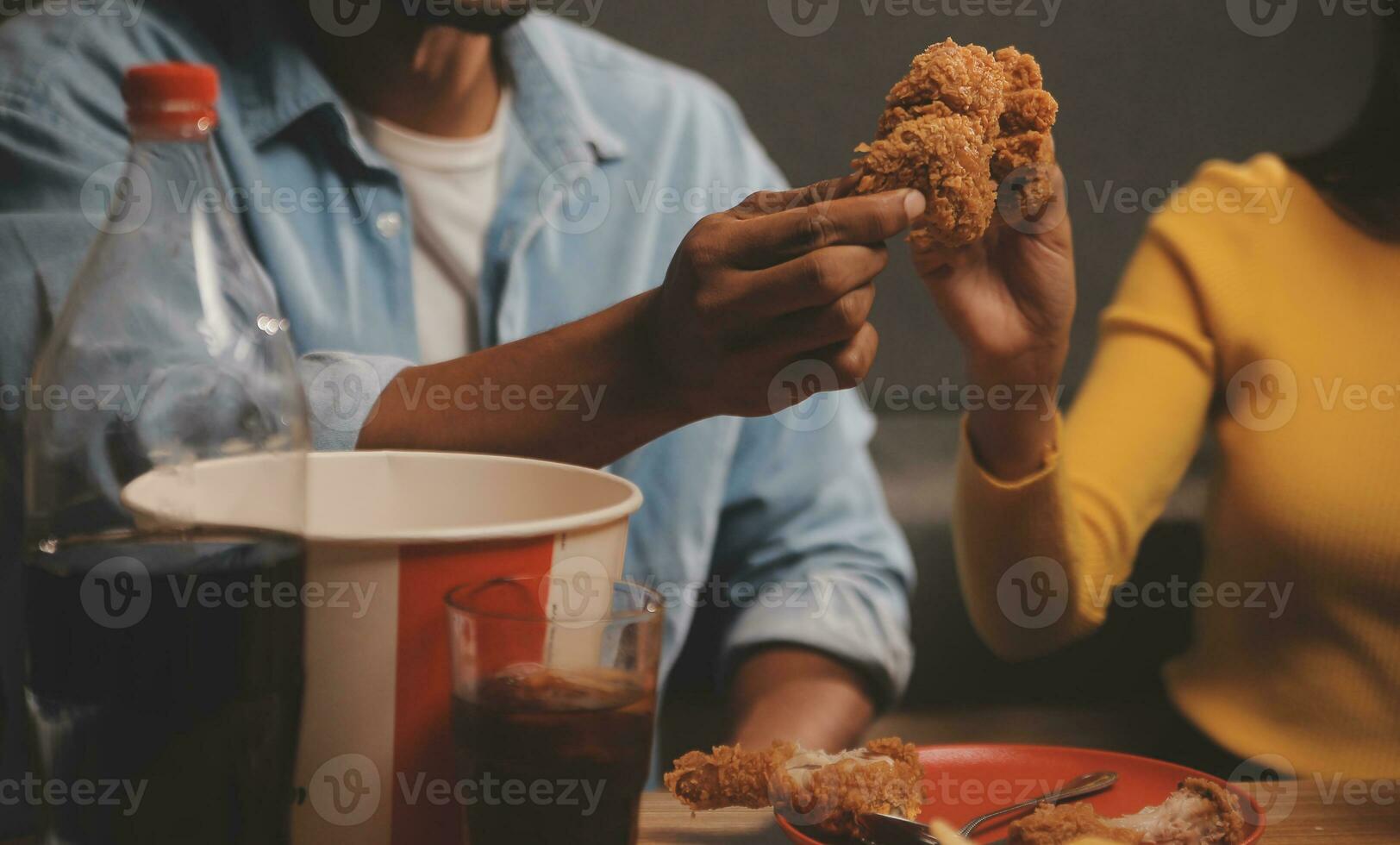 fat woman bite piece of pizza,overweight female is eating fast foods,asian girl is hungry photo