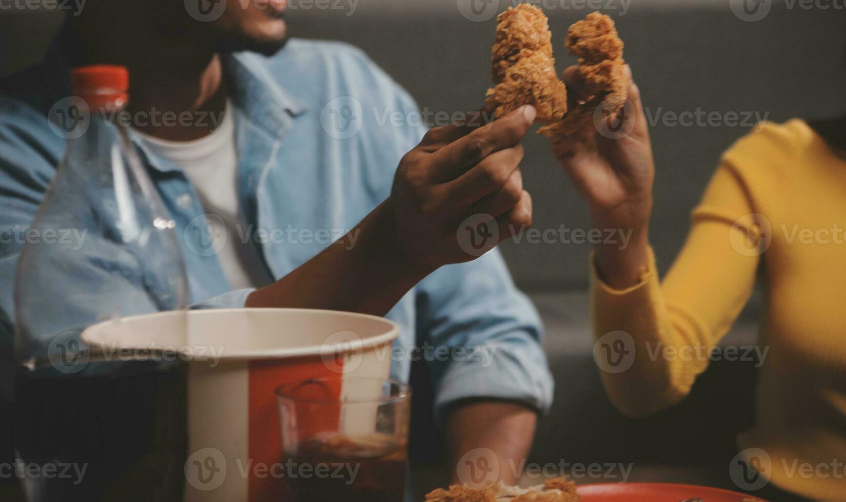 fat woman bite piece of pizza,overweight female is eating fast foods,asian girl is hungry photo