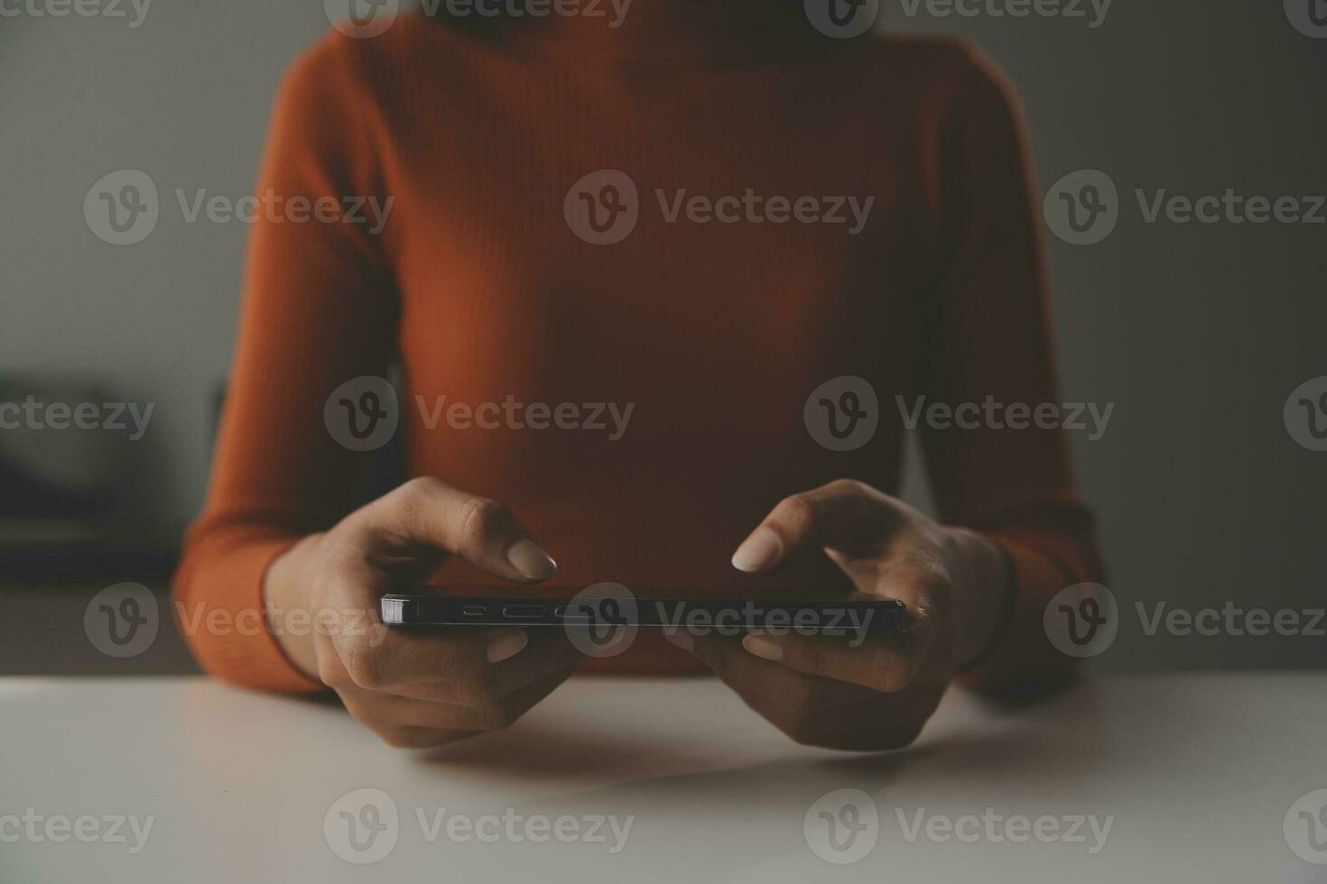 Asian Businesswoman Using laptop computer and working at office with calculator document on desk, doing planning analyzing the financial report, business plan investment, finance analysis concept. photo