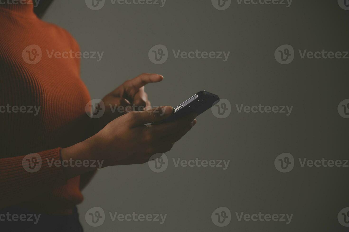Asian Businesswoman Using laptop computer and working at office with calculator document on desk, doing planning analyzing the financial report, business plan investment, finance analysis concept. photo