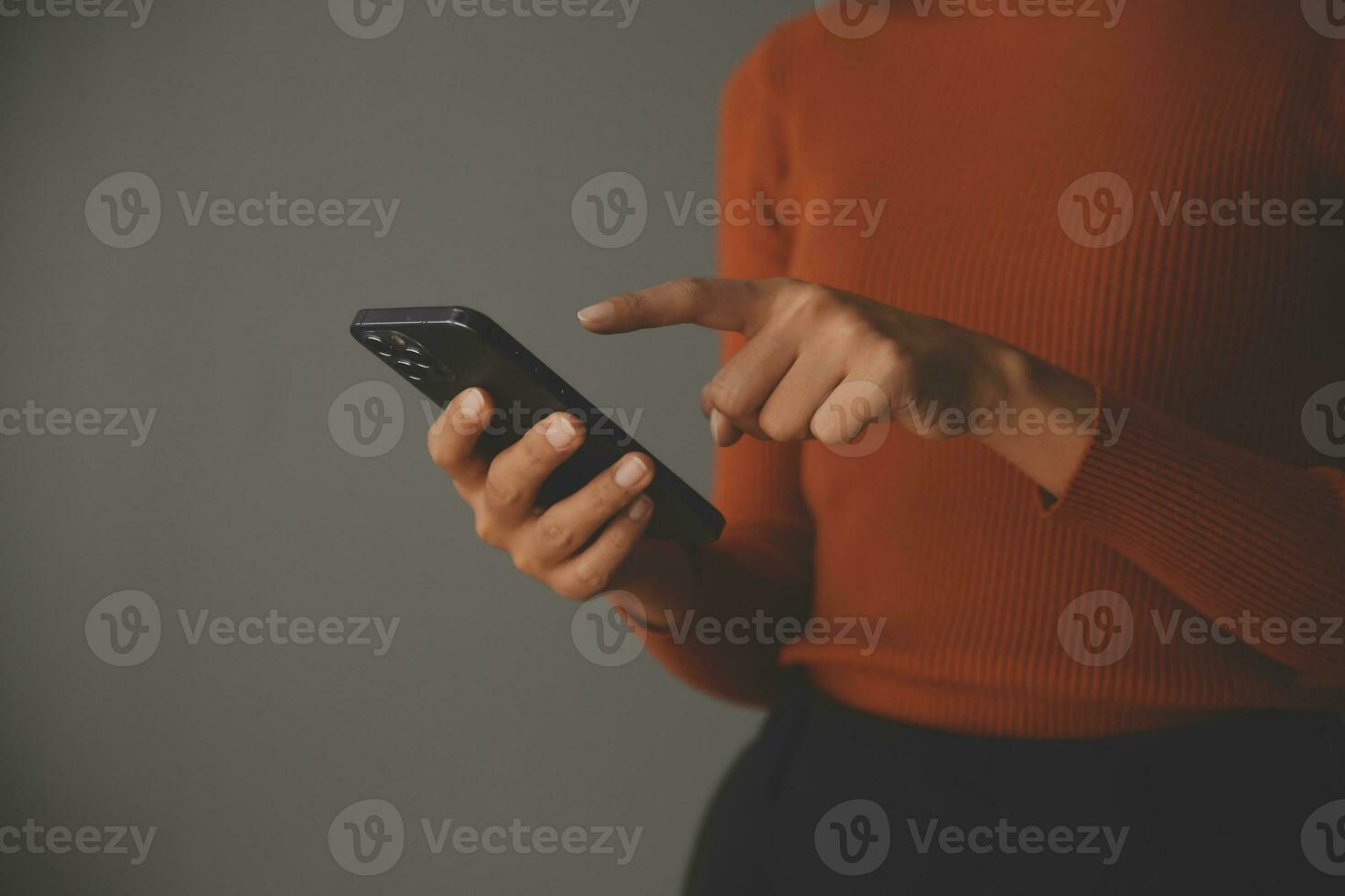 Asian Businesswoman Using laptop computer and working at office with calculator document on desk, doing planning analyzing the financial report, business plan investment, finance analysis concept. photo