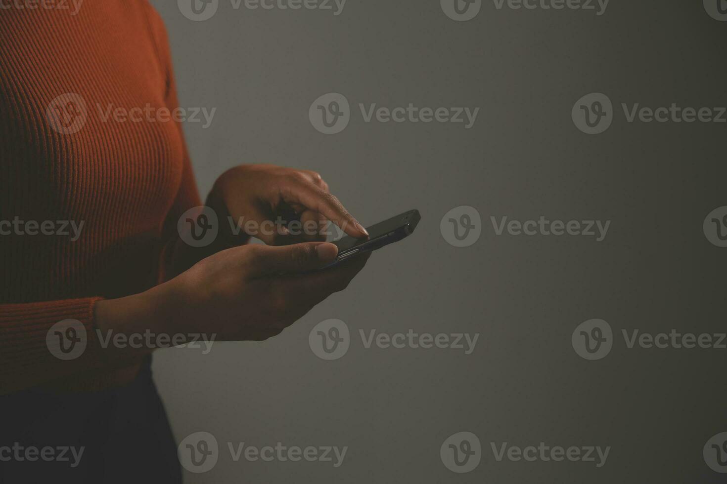 Asian Businesswoman Using laptop computer and working at office with calculator document on desk, doing planning analyzing the financial report, business plan investment, finance analysis concept. photo