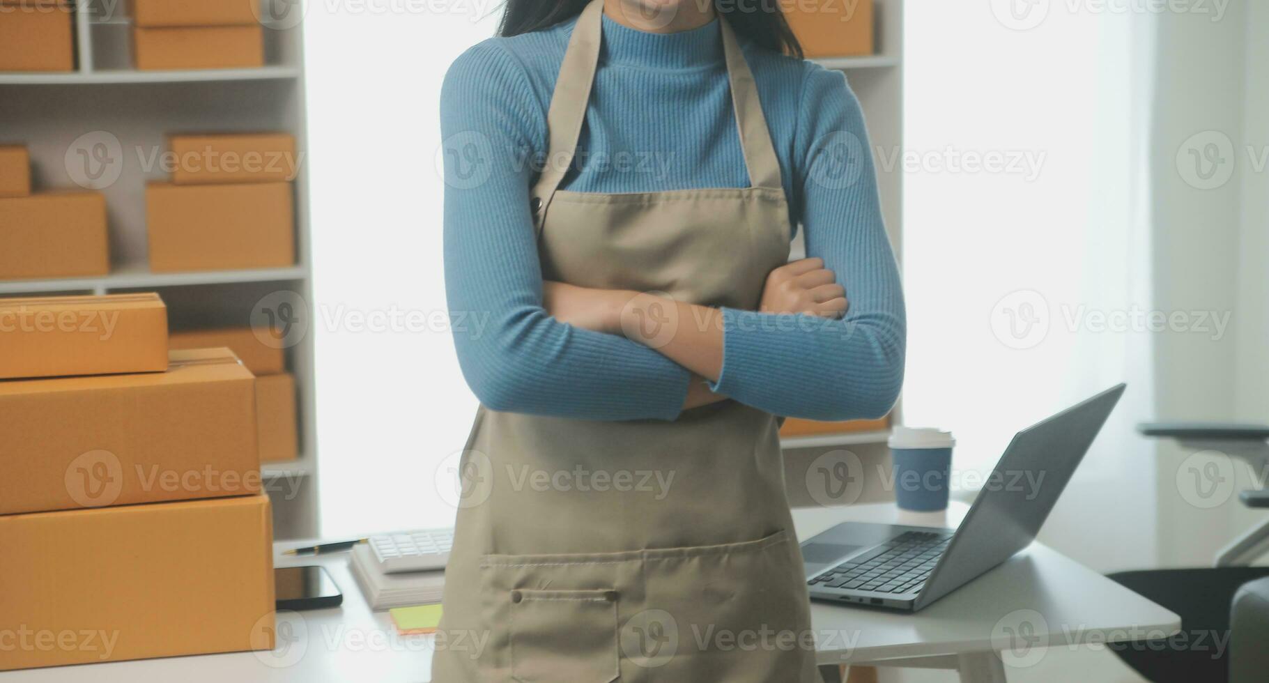 Business woman start up small business entrepreneur SME success .freelance woman working at home with Online Parcel delivery. SME and packaging deliveryconcept photo