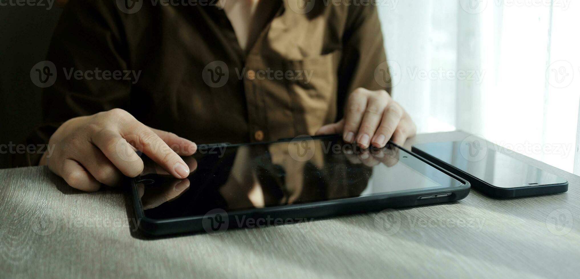 Creative Multiethnic Female Working on Laptop Computer in a Company Office. Happy Driven Project Manager Browsing Internet, Writing Tasks, Developing a Marketing Strategy for a Financial Institution. photo