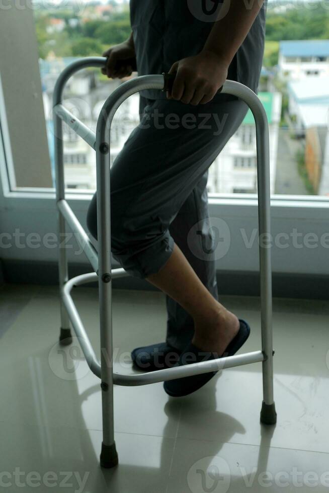 Physiotherapist is doing physical therapy for a patient, the patient has body aches due to overwork and has undergone treatment and physiotherapy with a professional physiotherapist. photo