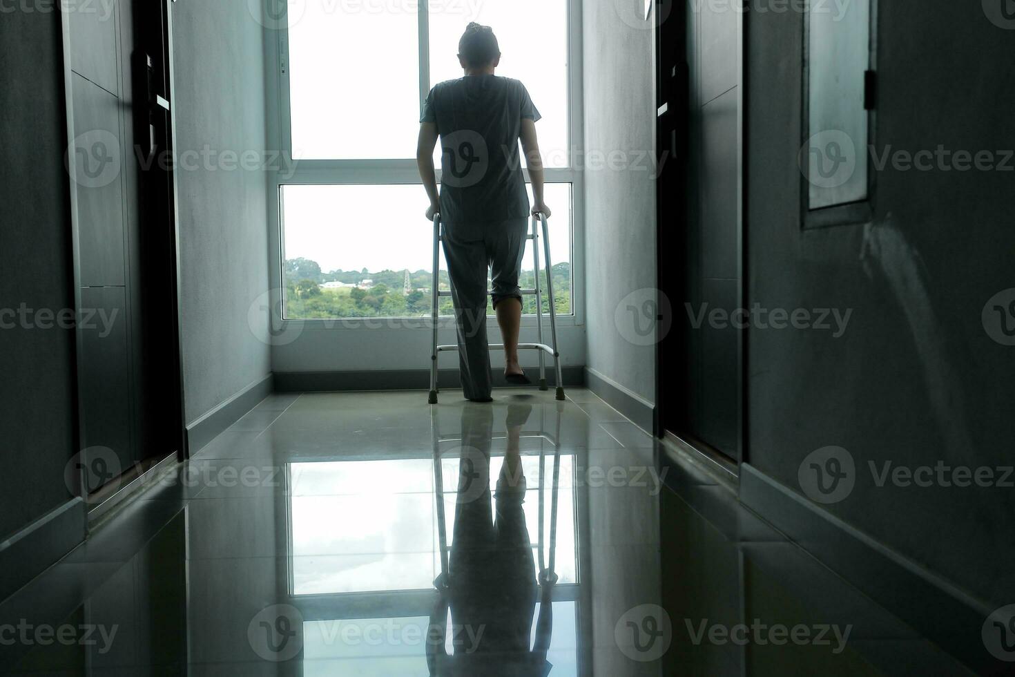 Physiotherapist is doing physical therapy for a patient, the patient has body aches due to overwork and has undergone treatment and physiotherapy with a professional physiotherapist. photo