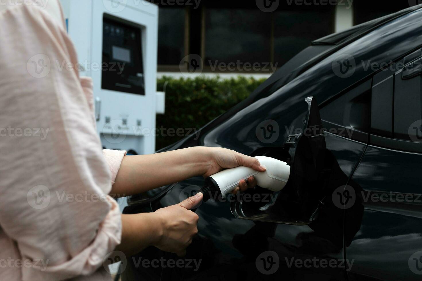 EV charging station for electric car in concept of green energy and eco power produced from sustainable source to supply to charger station in order to reduce CO2 emission . photo