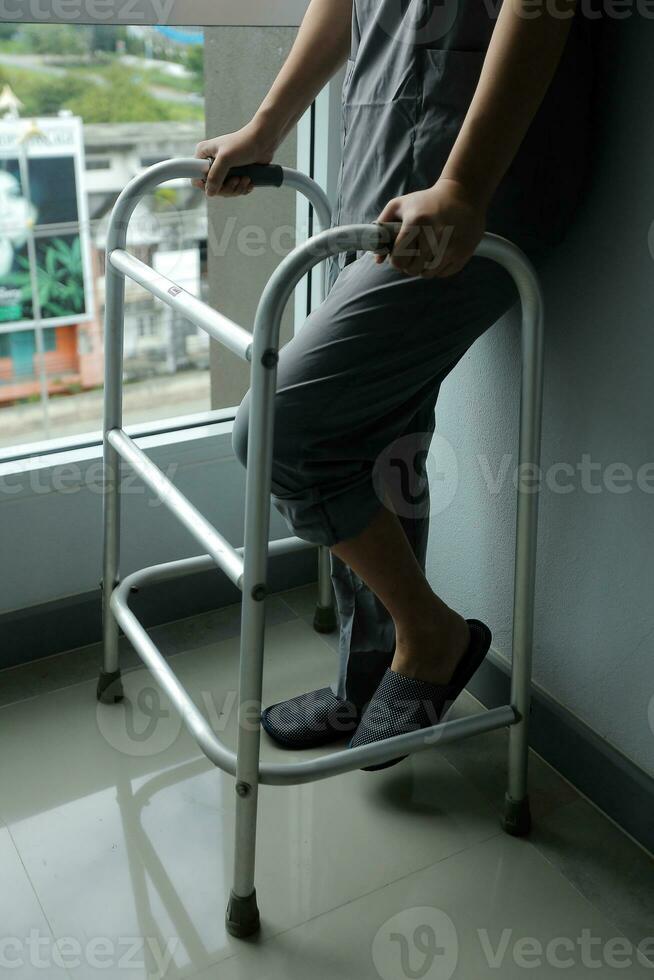 Physiotherapist is doing physical therapy for a patient, the patient has body aches due to overwork and has undergone treatment and physiotherapy with a professional physiotherapist. photo