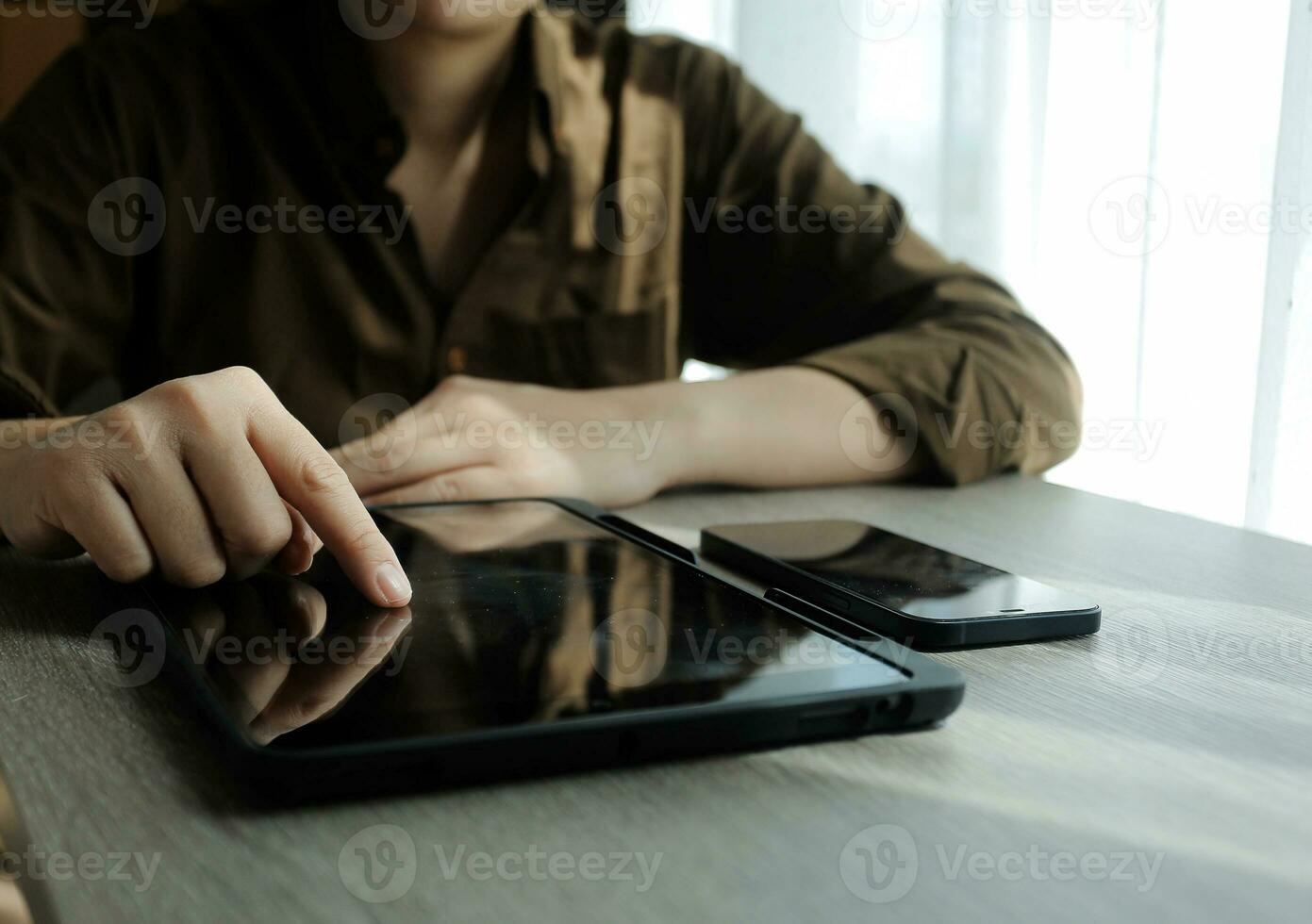 Creative Multiethnic Female Working on Laptop Computer in a Company Office. Happy Driven Project Manager Browsing Internet, Writing Tasks, Developing a Marketing Strategy for a Financial Institution. photo
