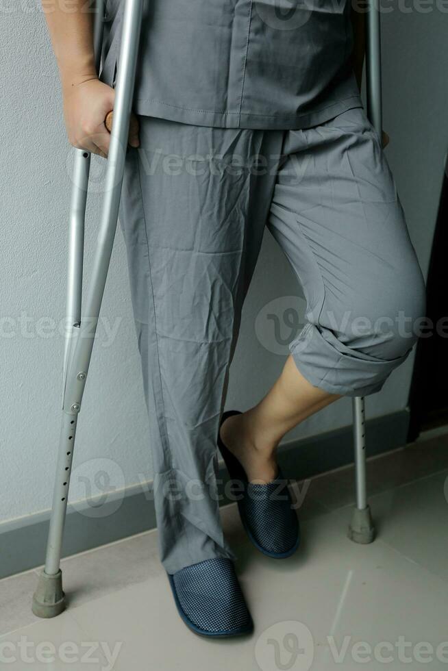 Physiotherapist is doing physical therapy for a patient, the patient has body aches due to overwork and has undergone treatment and physiotherapy with a professional physiotherapist. photo