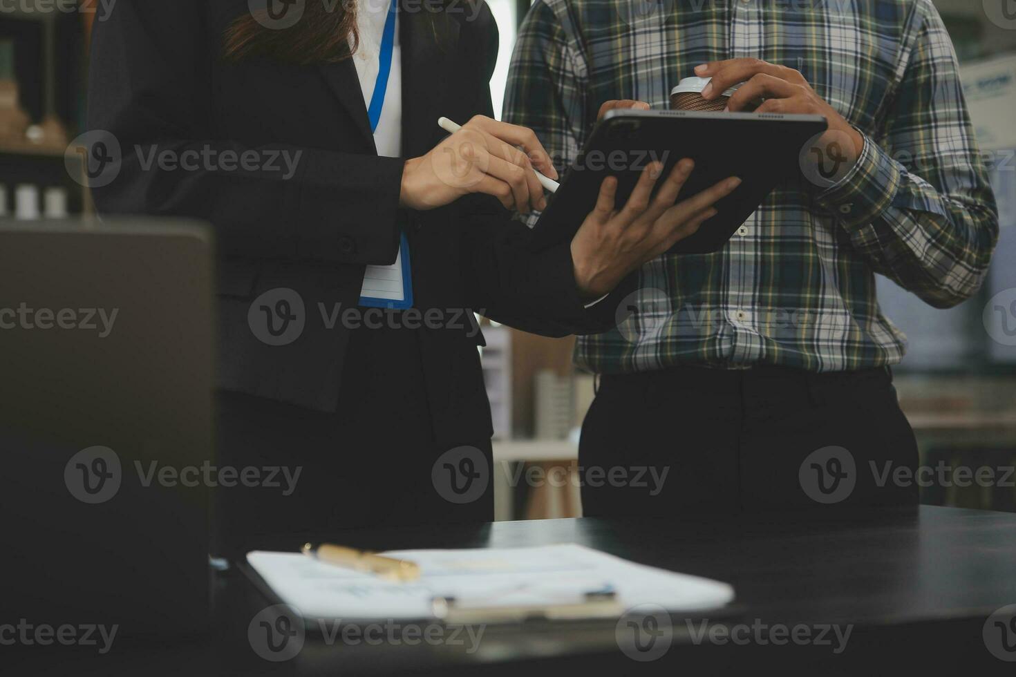 Audit concept,Administrator business man financial inspector and secretary making report calculating balance. Internal Revenue Service checking document. photo