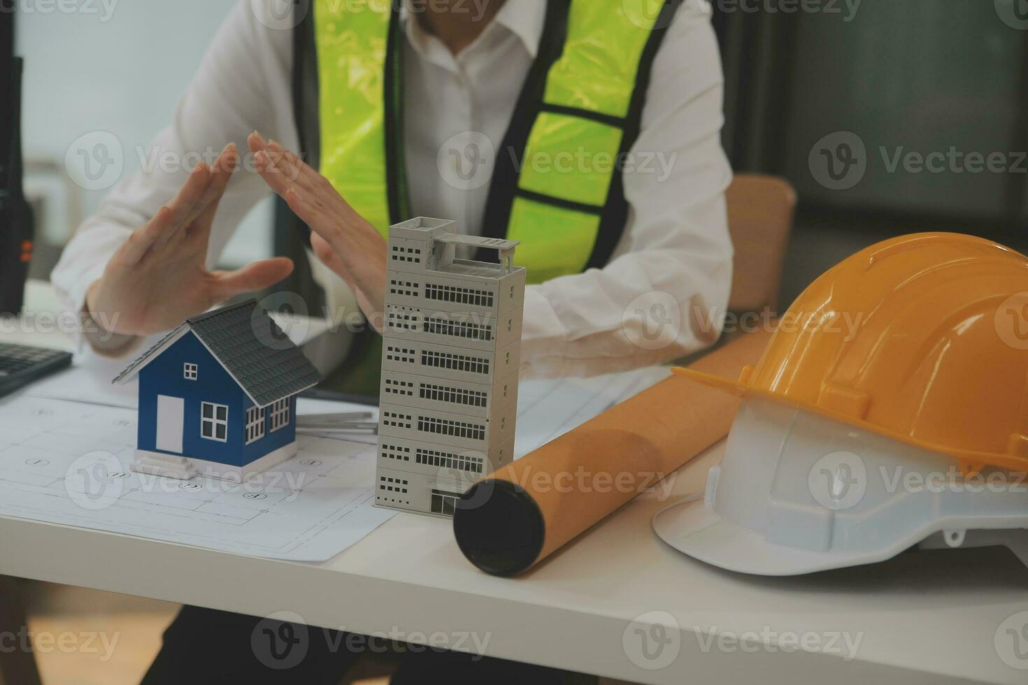 Engineer Teamwork Meeting, Drawing working on blueprint meeting for project working with partner on model building and engineering tools in working site, Construction and structure concept. photo