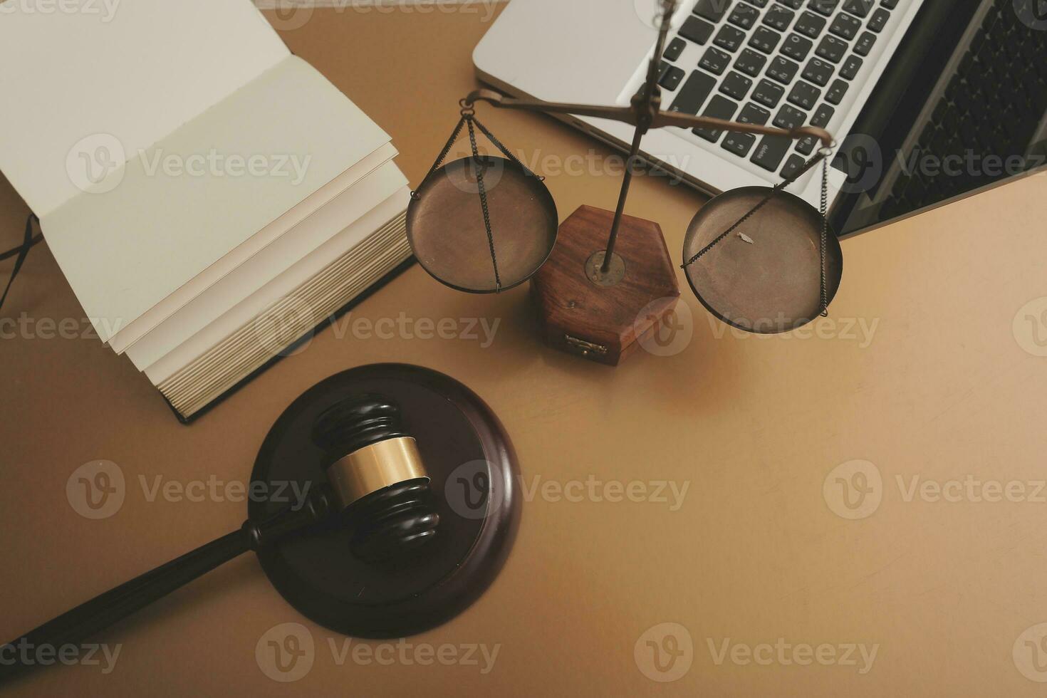 Business and lawyers discussing contract papers with brass scale on desk in office. Law, legal services, advice, justice and law concept picture with film grain effect photo