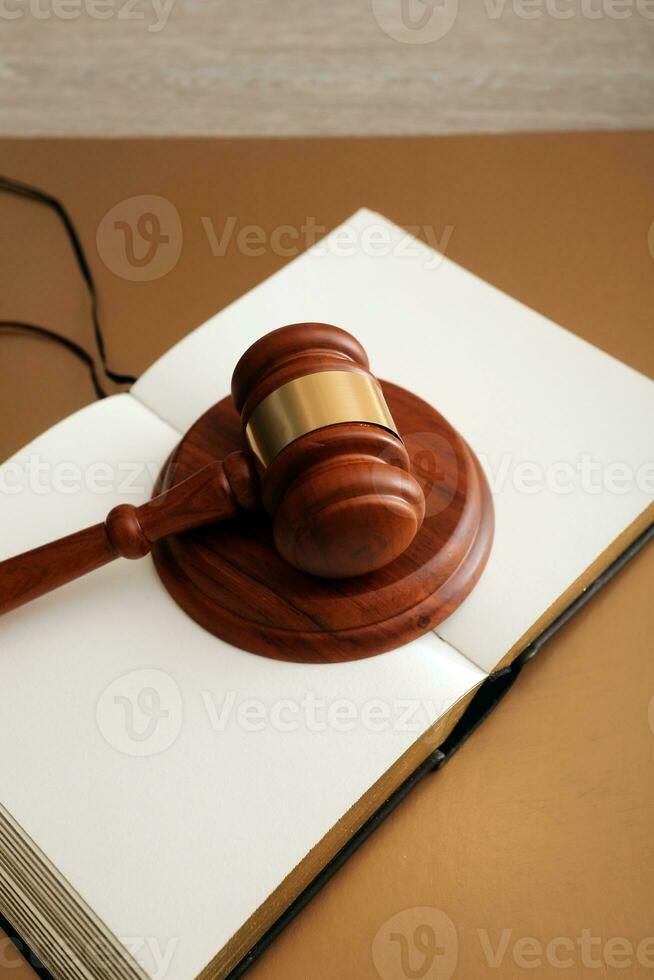 Business and lawyers discussing contract papers with brass scale on desk in office. Law, legal services, advice, justice and law concept picture with film grain effect photo