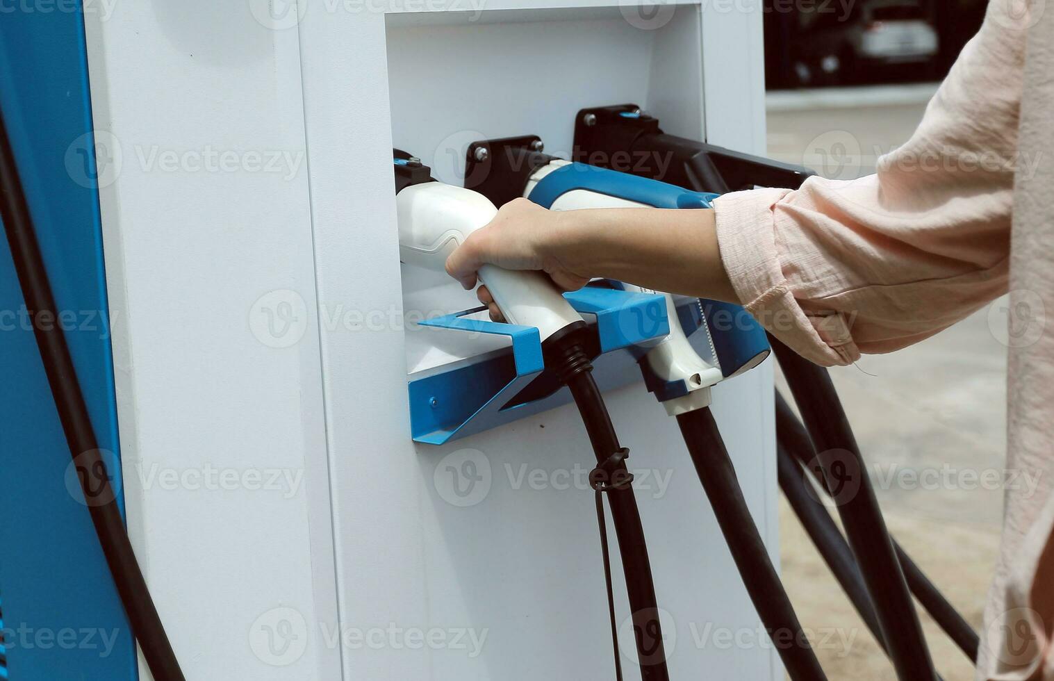 EV charging station for electric car in concept of green energy and eco power produced from sustainable source to supply to charger station in order to reduce CO2 emission . photo