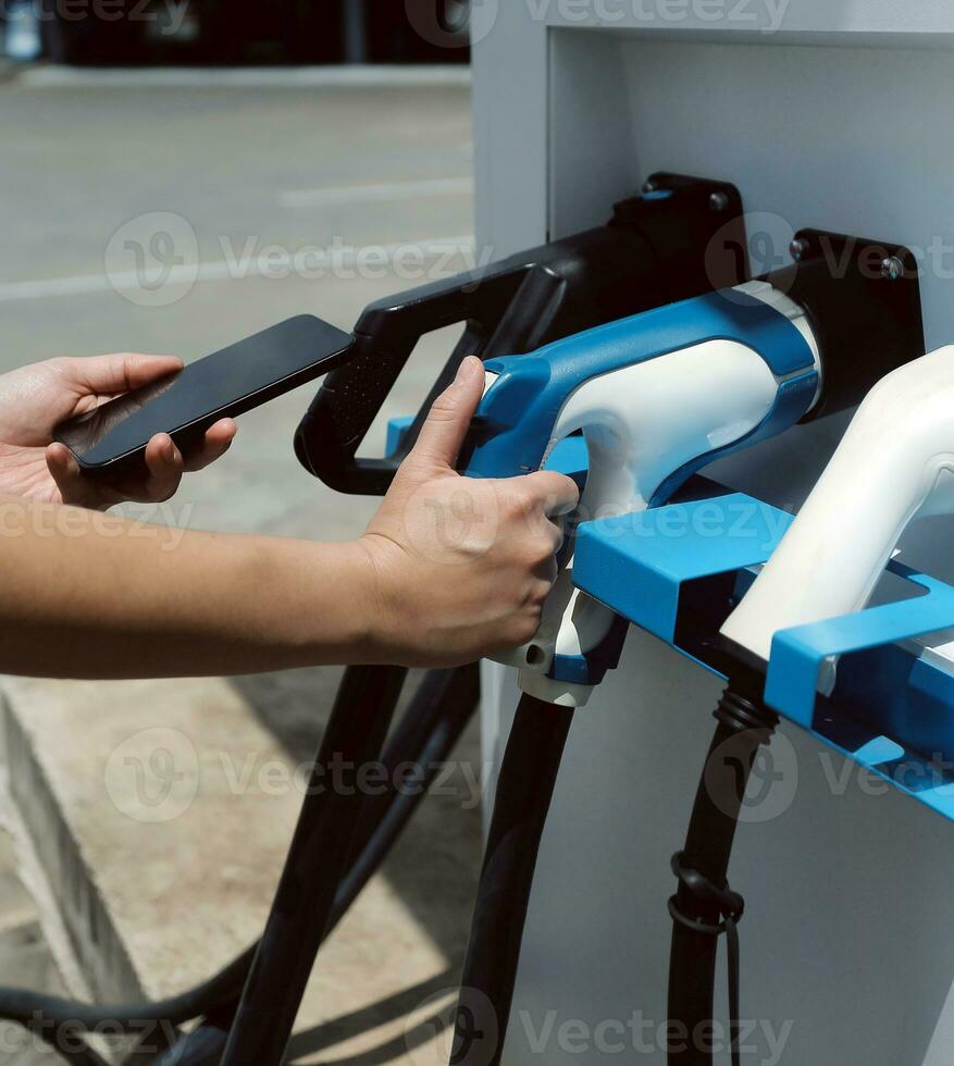 EV charging station for electric car in concept of green energy and eco power produced from sustainable source to supply to charger station in order to reduce CO2 emission . photo