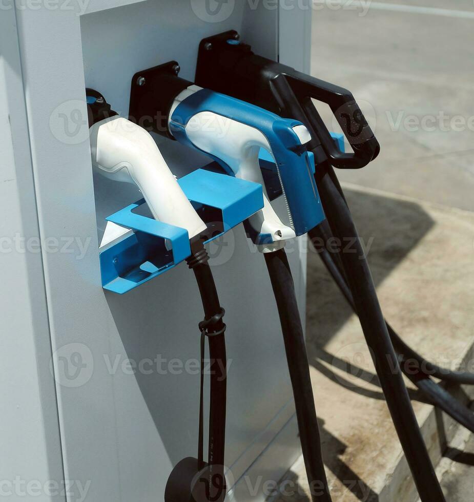 EV charging station for electric car in concept of green energy and eco power produced from sustainable source to supply to charger station in order to reduce CO2 emission . photo