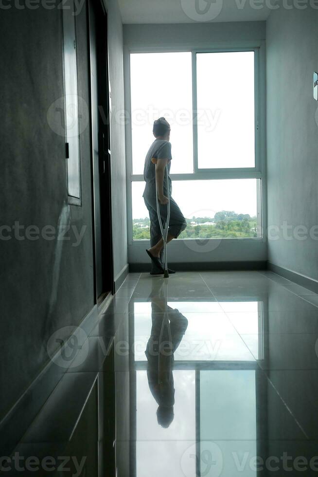 Physiotherapist is doing physical therapy for a patient, the patient has body aches due to overwork and has undergone treatment and physiotherapy with a professional physiotherapist. photo