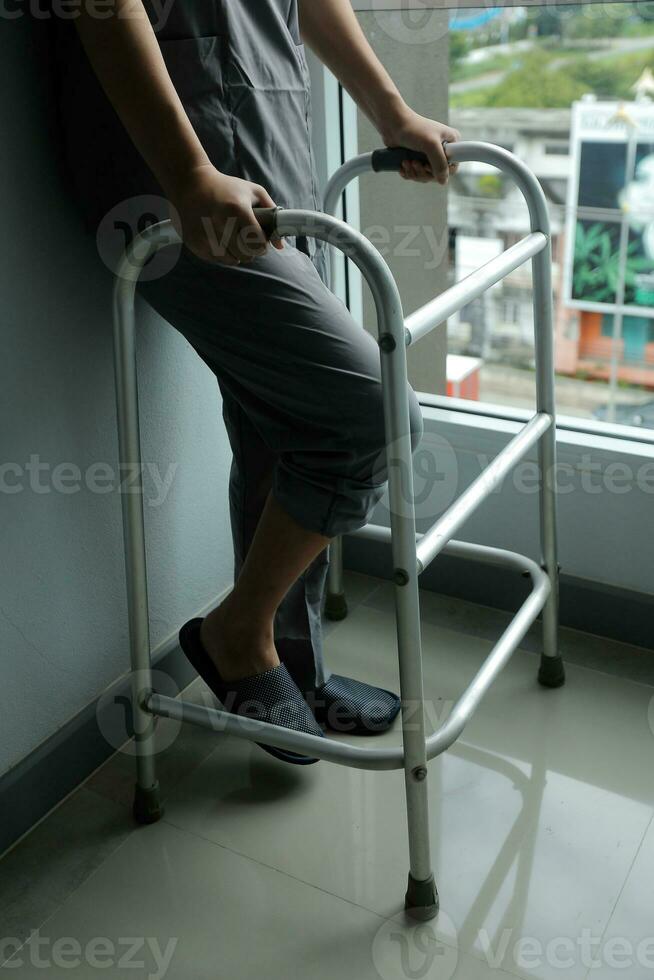 Physiotherapist is doing physical therapy for a patient, the patient has body aches due to overwork and has undergone treatment and physiotherapy with a professional physiotherapist. photo