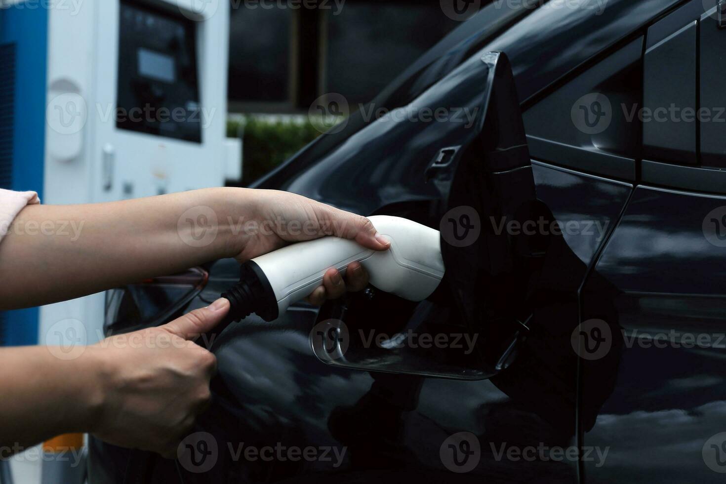 EV charging station for electric car in concept of green energy and eco power produced from sustainable source to supply to charger station in order to reduce CO2 emission . photo